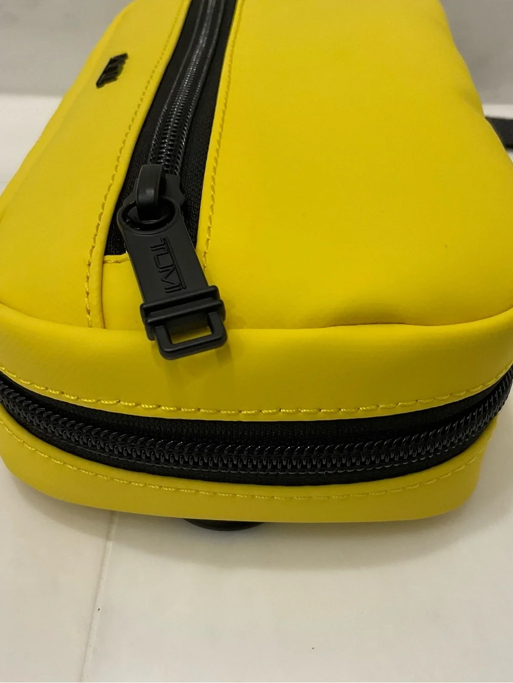 Tumi up sale